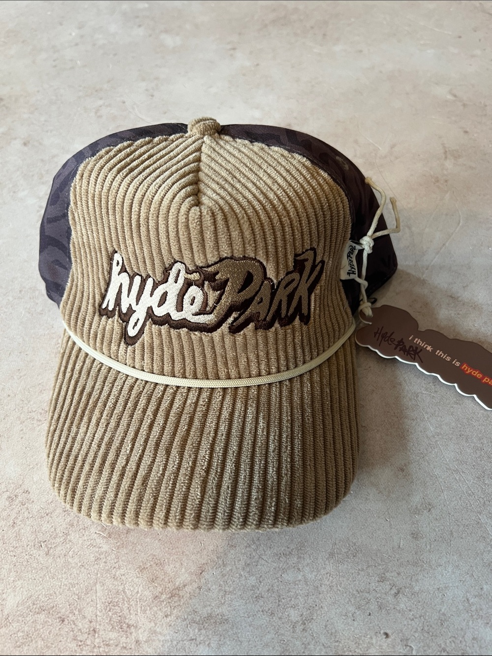 Hyde Park Corduroy Rope-Trim Trucker Hat in Tan and Brown. SnapBack Unisex.